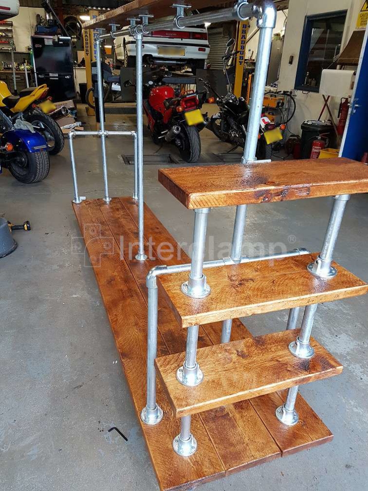 Interclamp tube and clamp clothes rail constructed with scaffold boards